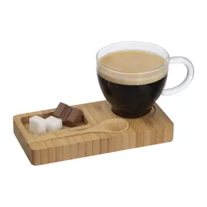 bamboo tray with spoon and glass mug
